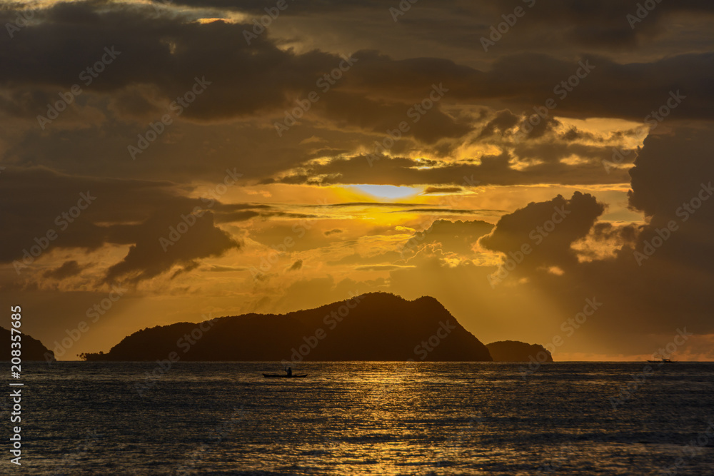 Fototapeta premium El Nido Palawan, Philippines. Tropical clouds in the sea on a sunset background. Cloudy landscape in the sea.