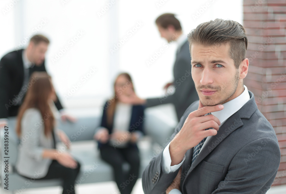 Young man in business suit smiling Young man in business suit smiling