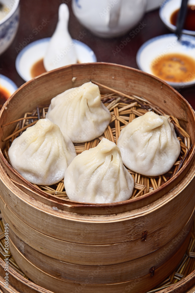 Small steamed buns in bamboo containers Small steamed buns in bamboo containers