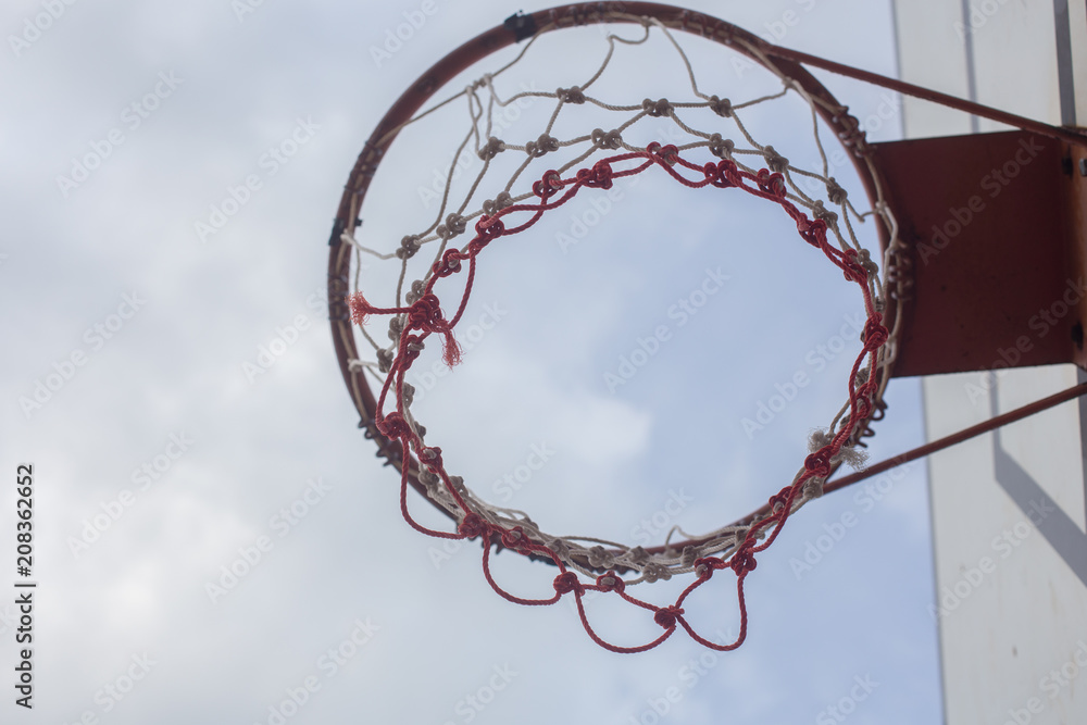 basketball hoopnet rim ring outdoor sports gyme sports score shot Abstract basketball hoop on sky with cloud background basketball hoopnet rim ring outdoor sports gyme sports score shot Abstract basketball hoop on sky with cloud background