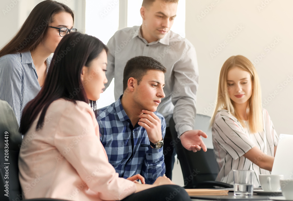 Young people having business meeting in office Young people having business meeting in office