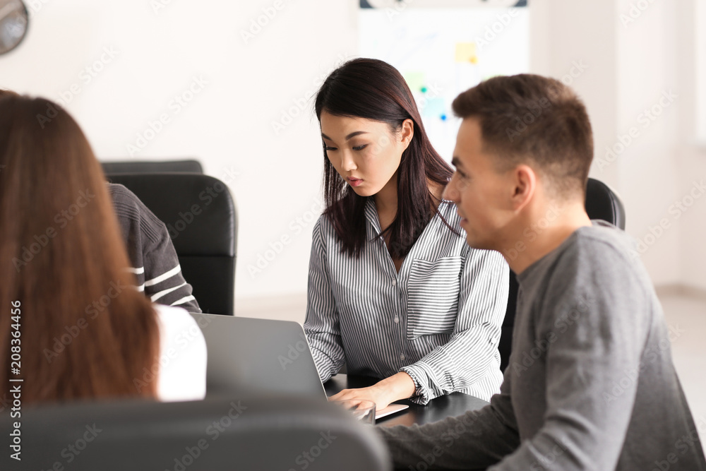 Young people having business meeting in office Young people having business meeting in office