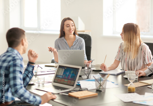 Wallpaper Mural Young people having business meeting in office Torontodigital.ca