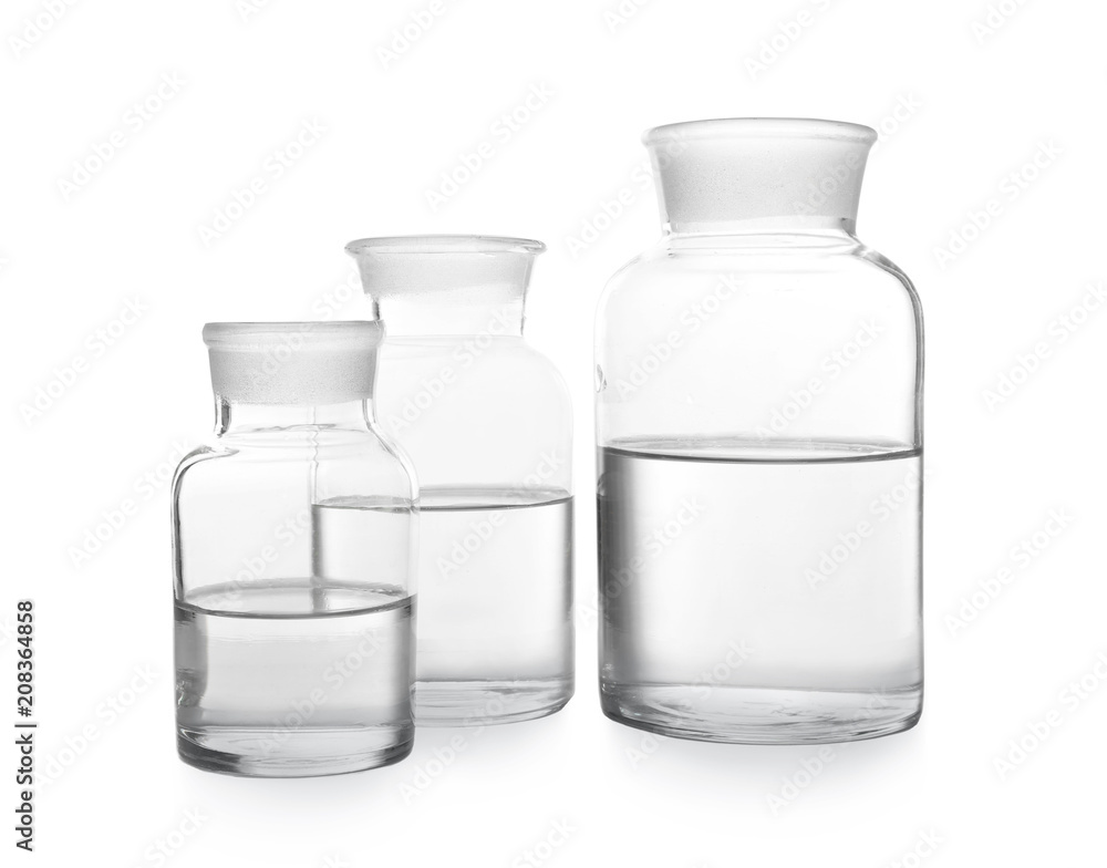 Glass bottles with water on white background Glass bottles with water on white background