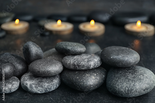 Pile of spa stones on dark table
