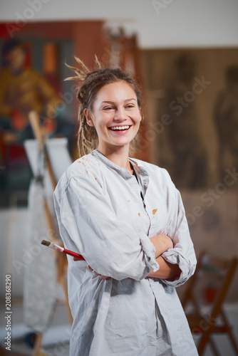 Portrait of an Artistic girl her atelier. photo