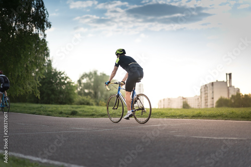 Cyclist in maximum effort in a road outdoors