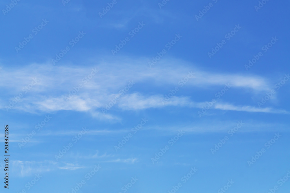 blye sky with white fluffy clouds background.