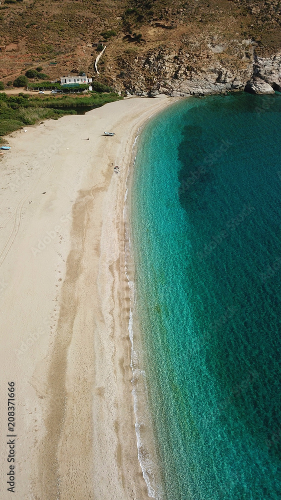 Aerial drone bird's eye view photo of iconic beach of Potami or River with turquoise clear waters, South Evia island, Greece