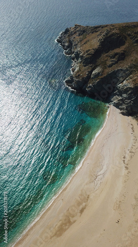 Aerial drone bird's eye view photo of iconic beach of Potami or River with turquoise clear waters, South Evia island, Greece photo