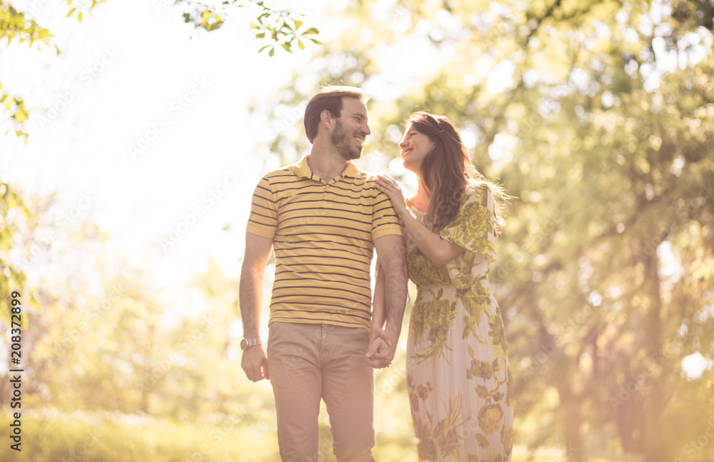 Fototapeta premium Couple in love . Walking trough nature.