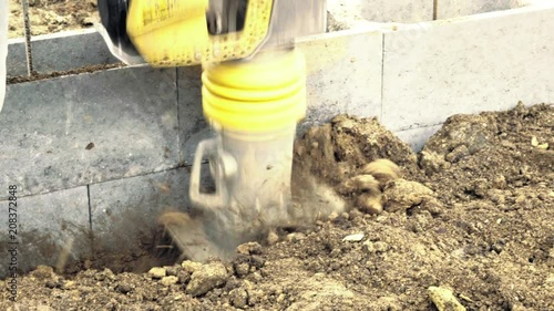 Jumping Jack Compactor, vibratory blower, mechanical jump. Compaction machines, machines for earth compaction. Detail of ground works, construction industry