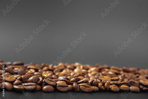 cereal coffee in bulk on a black background. © makam1969