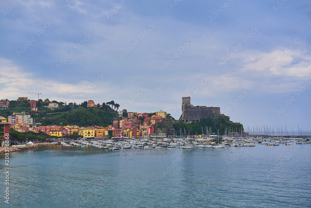 Colorful Houses and Seascape with Old castle and Blue Cloudy Sky