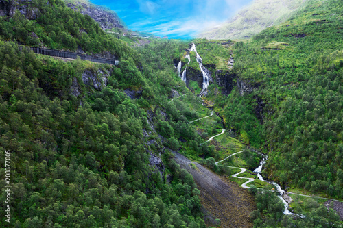 Fototapeta road and waterfalls in famous Flam valley