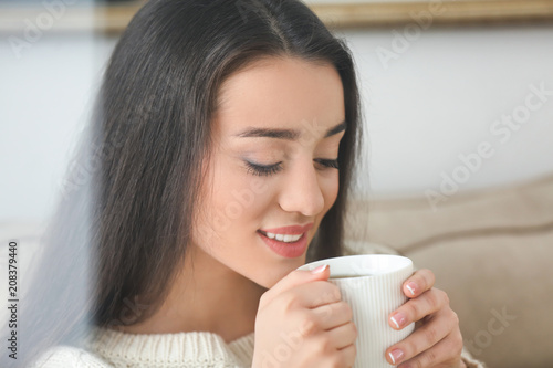 Beautiful young woman with ...