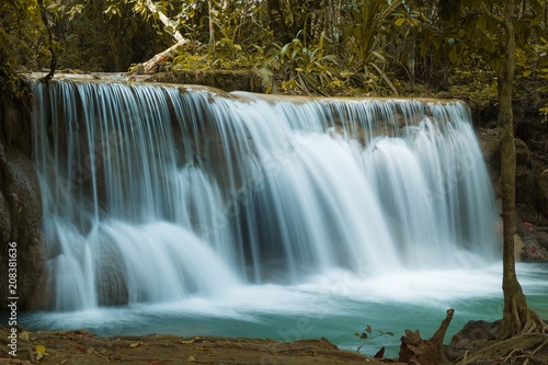 Fototapeta Naklejka Na Ścianę i Meble -  Huay Mae Khamin waterfalls in deep forest at Srinakarin National Park ,Kanchanaburi ,A beautiful stream water famous rainforest waterfall in Thailand