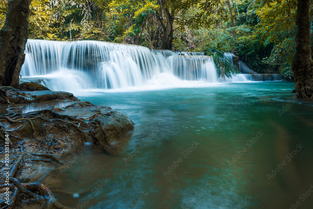 Huay Mae Khamin waterfalls in deep forest at Srinakarin National Park ,Kanchanaburi ,A beautiful stream water famous rainforest waterfall in Thailand Huay Mae Khamin waterfalls in deep forest at Srinakarin National Park ,Kanchanaburi ,A beautiful stream water famous rainforest waterfall in Thailand