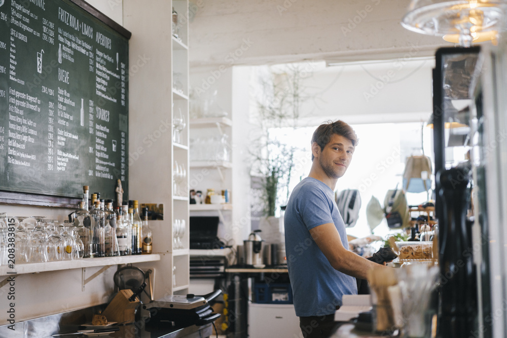 Portrait of smiling man in cafe Portrait of smiling man in cafe