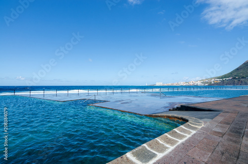 View of natural outdoor swimming pools in the small fishing village Bajamar. Tenerife  Canary Islands  Spain. 