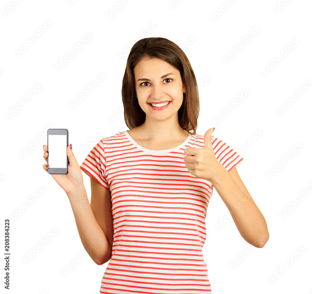 Pretty smiling woman showing a blank vertical smart phone screen and thumb up. emotional girl isolated on white background Pretty smiling woman showing a blank vertical smart phone screen and thumb up. emotional girl isolated on white background