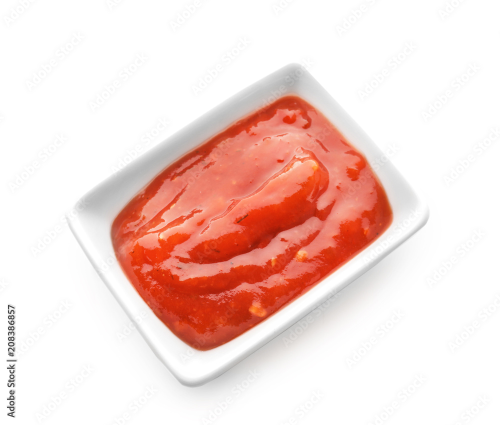 Bowl with delicious tomato sauce on white background Bowl with delicious tomato sauce on white background