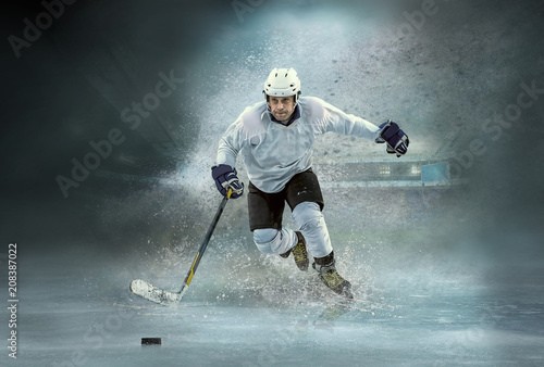 Photo Caucasian ice hockey Players in dynamic action in a professional