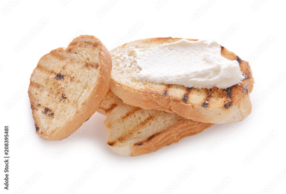 Toasted bread with cream cheese on white background