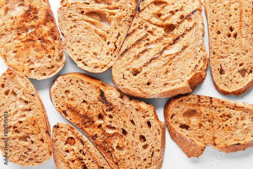 Tasty toasted bread as background