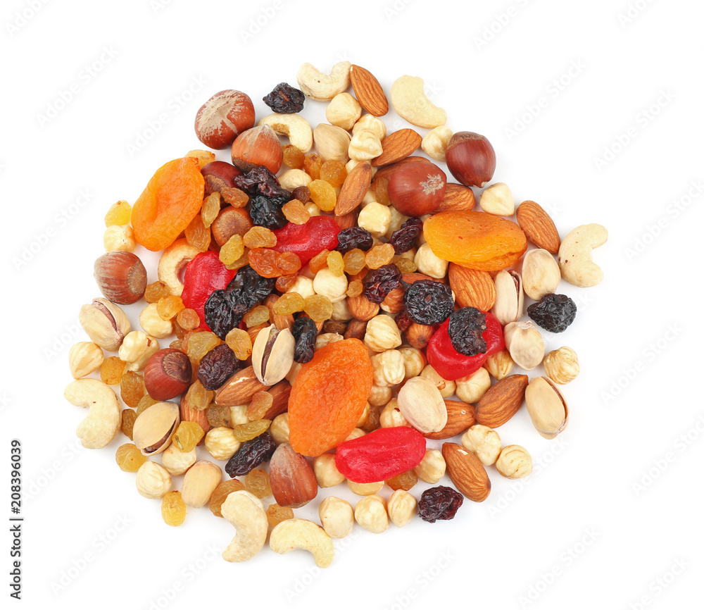 Different nuts, dried fruits and berries on white background, top view Different nuts, dried fruits and berries on white background, top view
