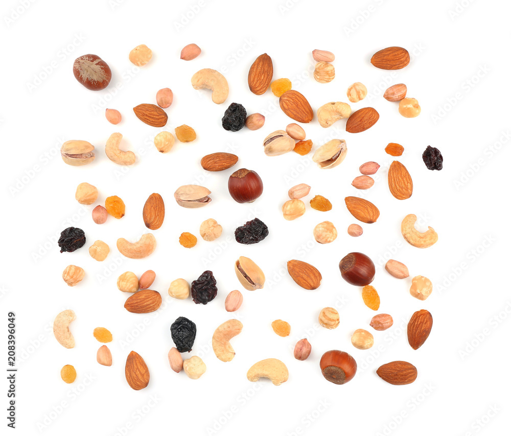 Different nuts and dried berries on white background, top view Different nuts and dried berries on white background, top view