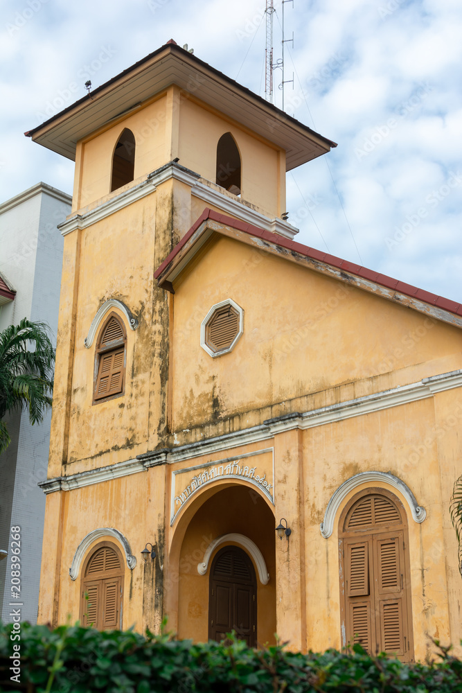 TRANG, THAILAND - June 6, 2018 : Close up historic Christian church Building age over 100 years old in Trang District, Trang Thailand. TRANG, THAILAND - June 6, 2018 : Close up historic Christian church Building age over 100 years old in Trang District, Trang Thailand.