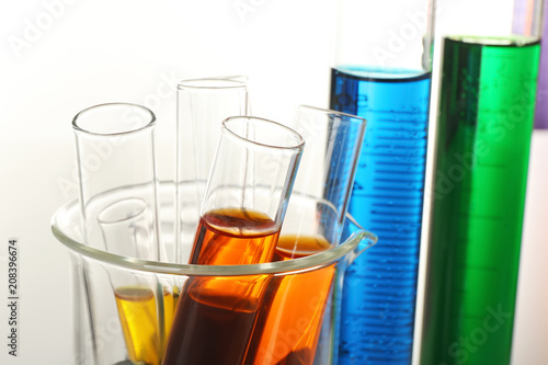 Test tubes with colorful liquids, closeup