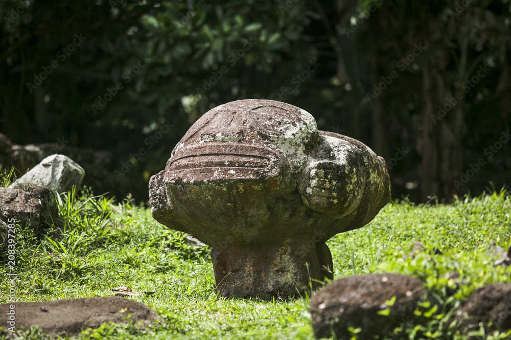 historic stone statues, so called Tikis, created by native inhabitants