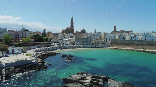 White city Monopoly and blue sea coastline in Italy Drone flight 4k