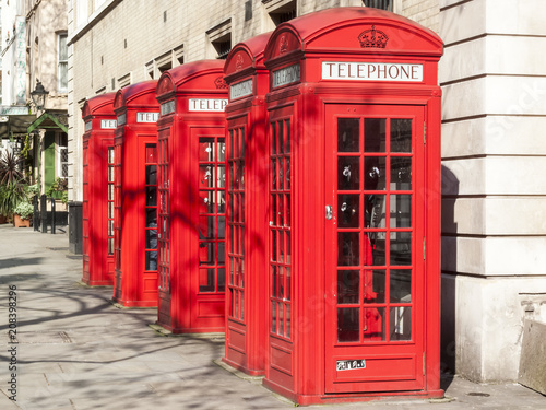 Traditional red cast iron telephone boxes in London