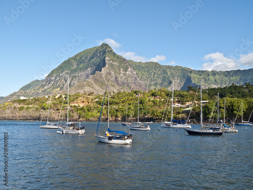 Sailing yachts anchoring in...