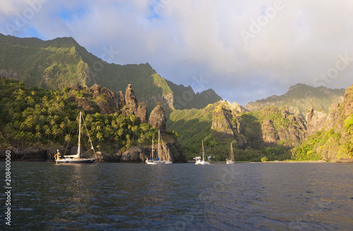 Sailing yachts anchoring in...