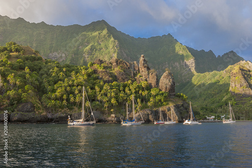 Sailing yachts anchoring in...