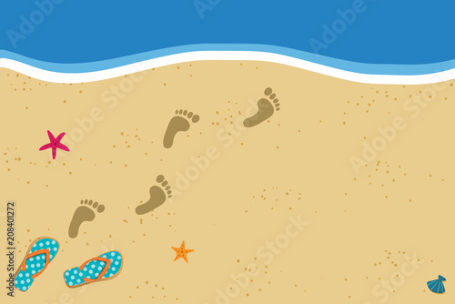 Summer border with copy space flip flops and foot prints on sandy beach background
