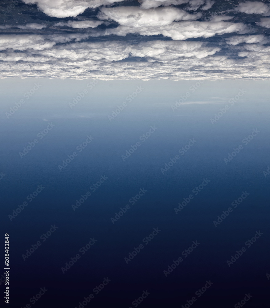 Cosmic blue sky and white clouds view Cosmic blue sky and white clouds view
