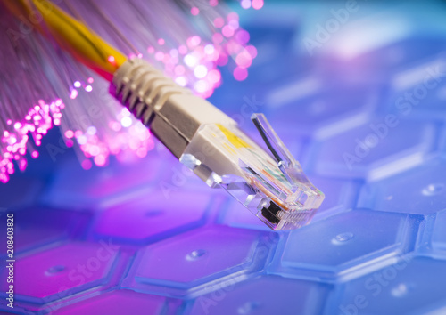 network cable closeup with fiber optical background photo