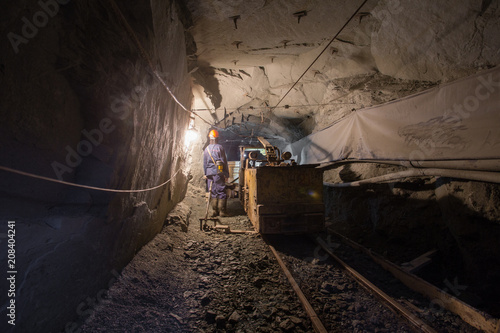 Underground old ore gold mine tunnel shaft passage mining technology with locomotive