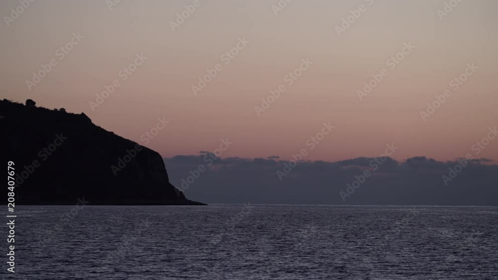 Sky after sunset over sea water surface, Greece Peloponnese