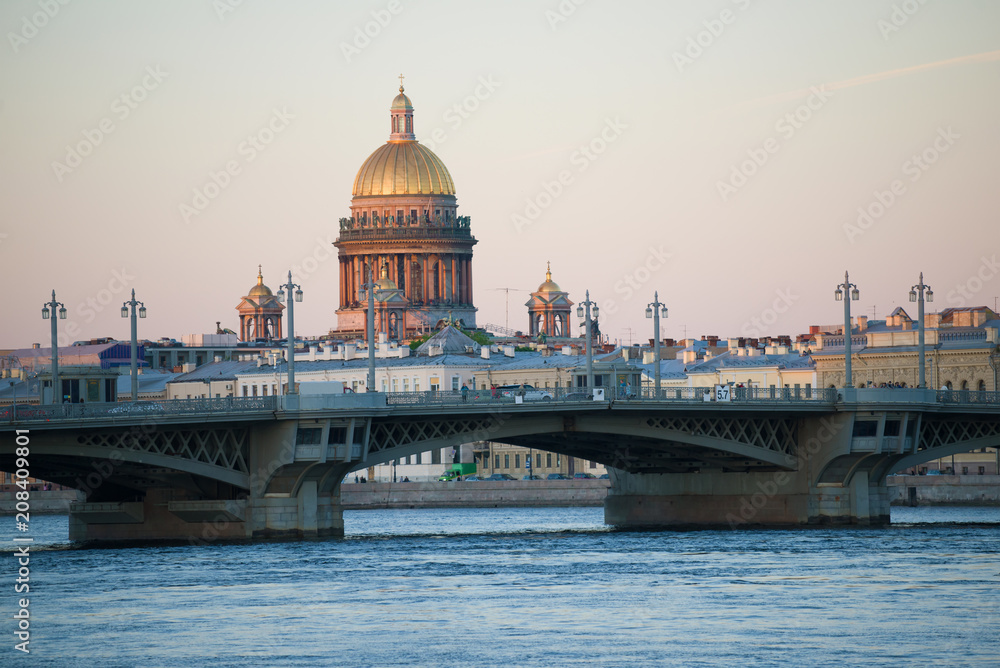 Blagoveshchensky Bridge and dome of St. Isaac Cathedral in the May evening. St. Petersburg, Russia