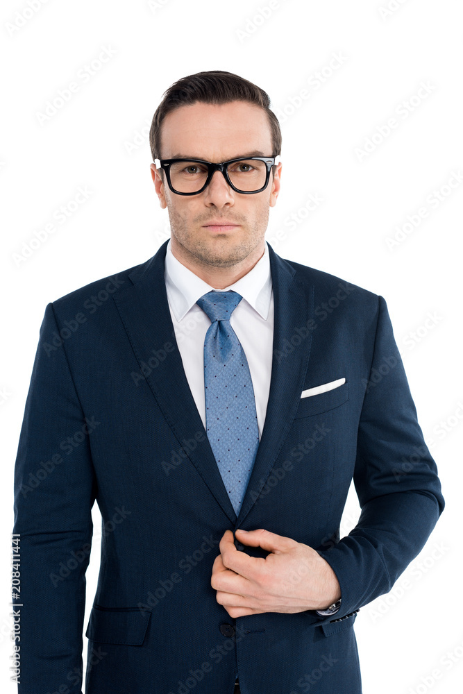 handsome buisnessman in eyeglasses and suit looking at camera isolated on white handsome buisnessman in eyeglasses and suit looking at camera isolated on white