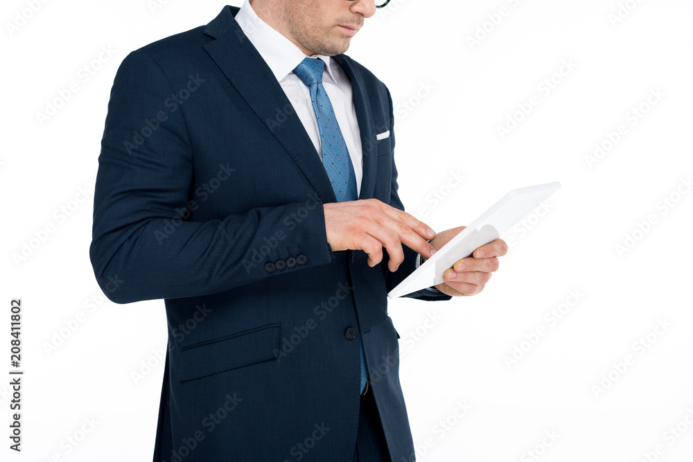 cropped shot of businessman in formal wear using digital tablet isolated on white cropped shot of businessman in formal wear using digital tablet isolated on white