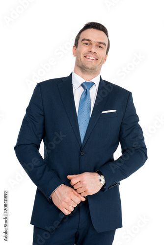 portrait of handsome middle aged businessman smiling at camera isolated on white