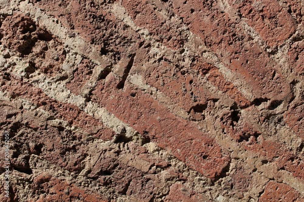 Old broken brick wall close-up