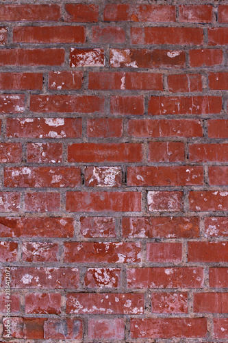 Old broken brick wall close-up